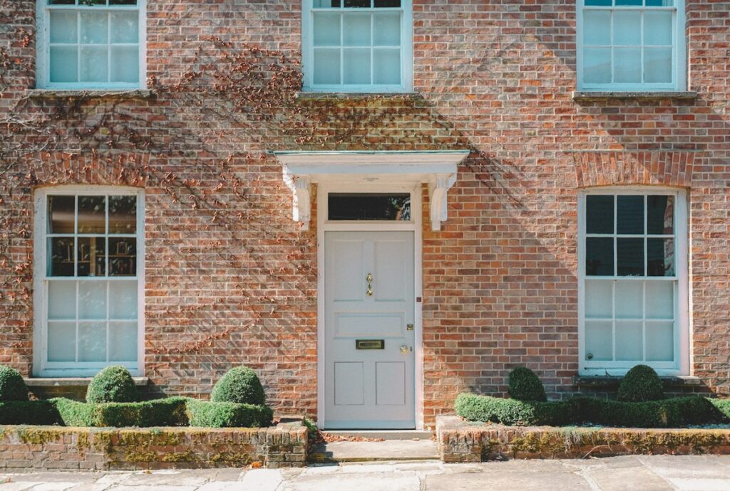 Brick house with a white front door