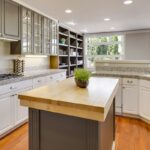 Kitchen countertops and cabinetry in a bright home