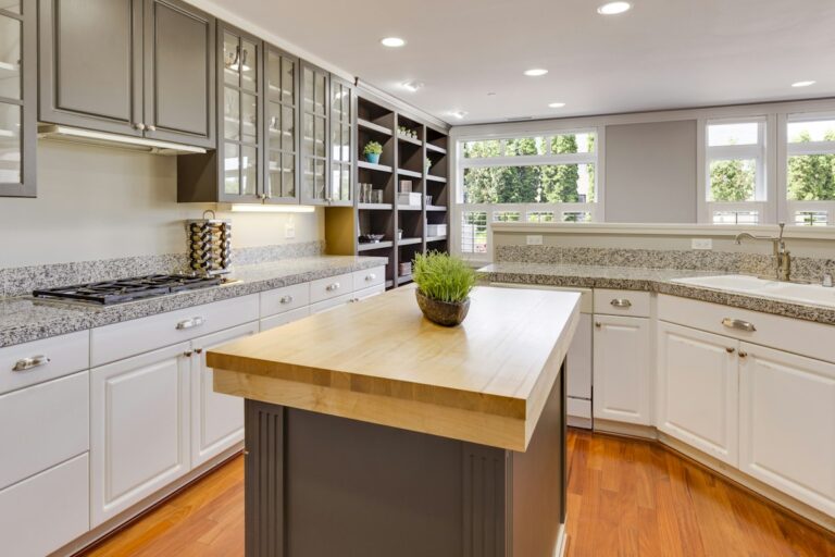 Kitchen countertops and cabinetry in a bright home