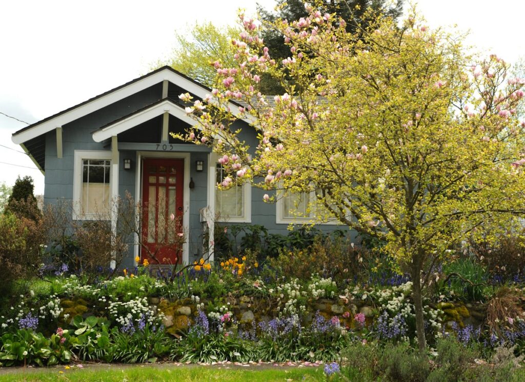 Garden and flowering plants surrounding a residential home