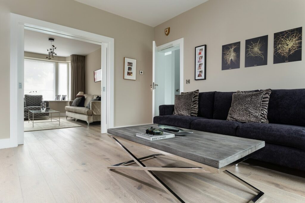 Living room with wood-look plank flooring and furniture